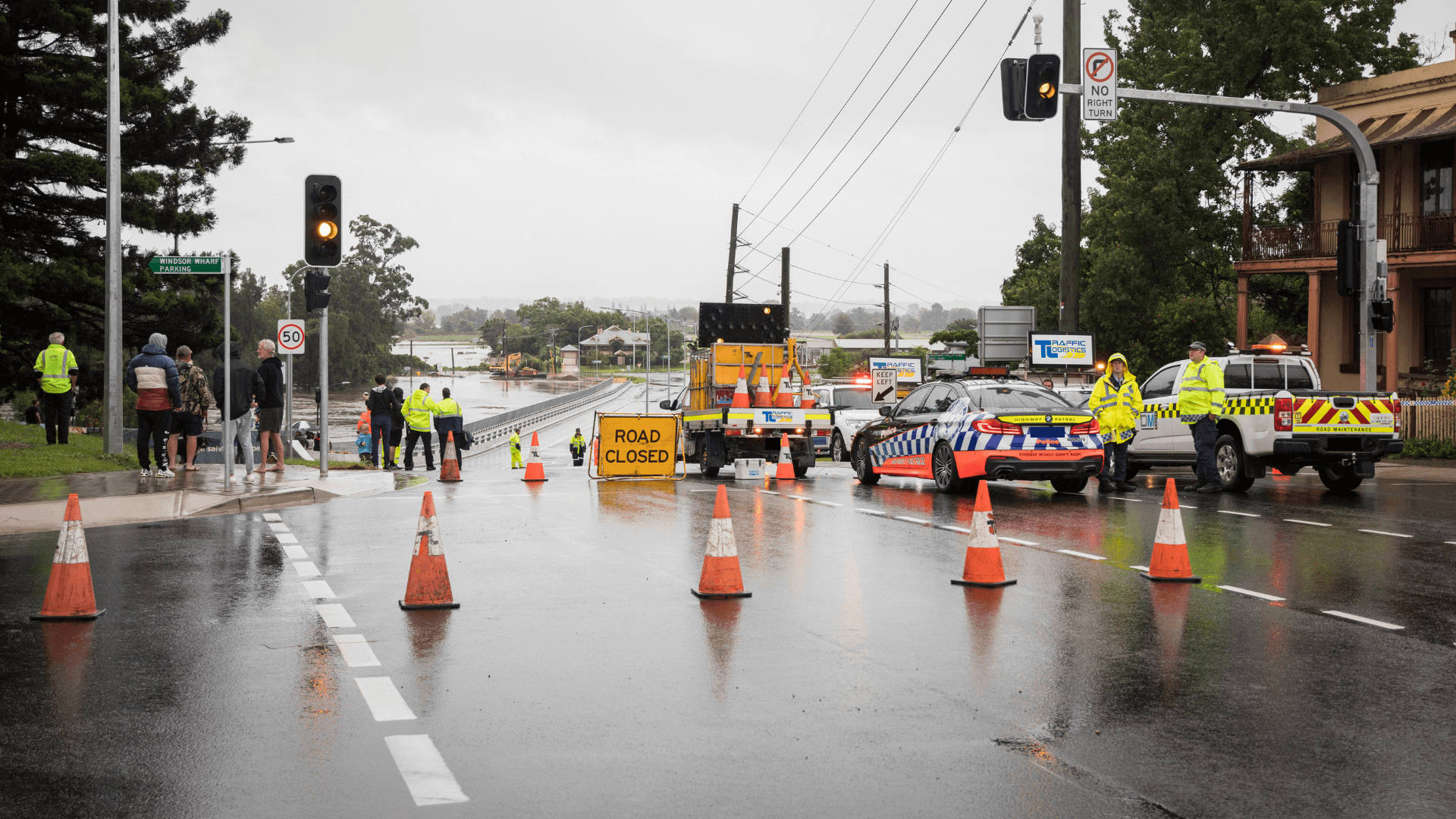Emergency services close off road for glooding
