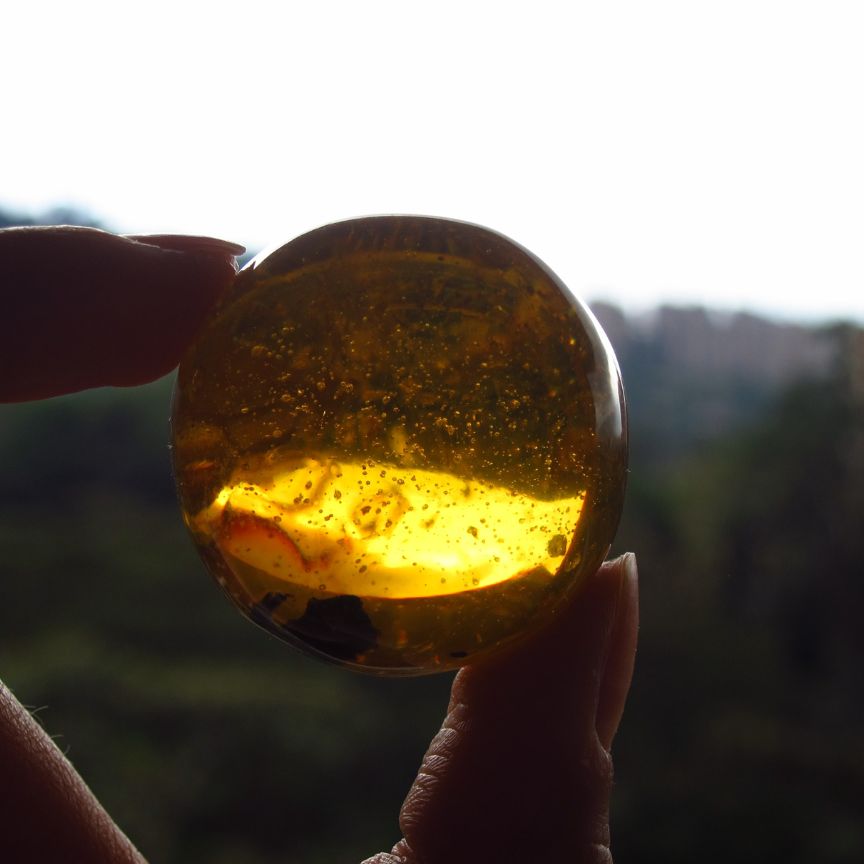 Amber Gemstone held in hand