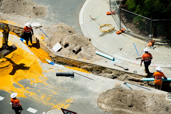 Worker checking the location of overhead powerlines