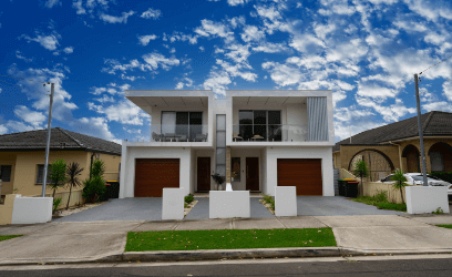 Duplex house with private poles in front yard